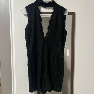BEBE Black Sleeveless Lace V-Neck Cocktail romper